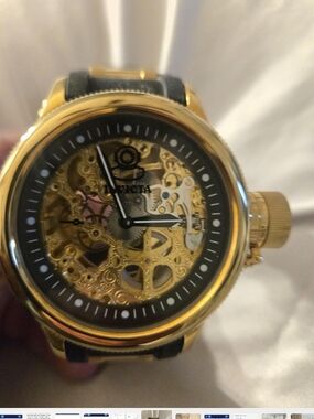 Invicta Gold and Black Skeleton Dial Mechanical Watch
